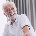 Man smiling with dentures