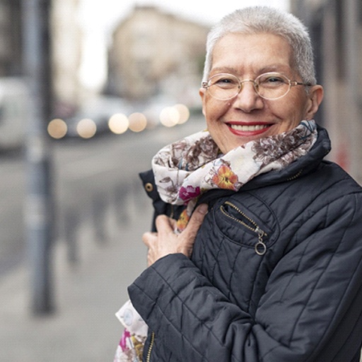 Woman smiling with dentures in Fort Worth