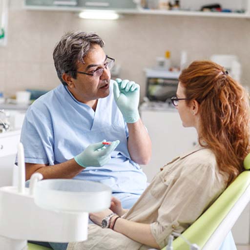 patient talking to emergency dentist in Fort Worth