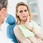 Patient experiencing tooth pain at dentist’s office