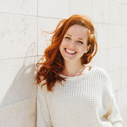 Woman smiling outside