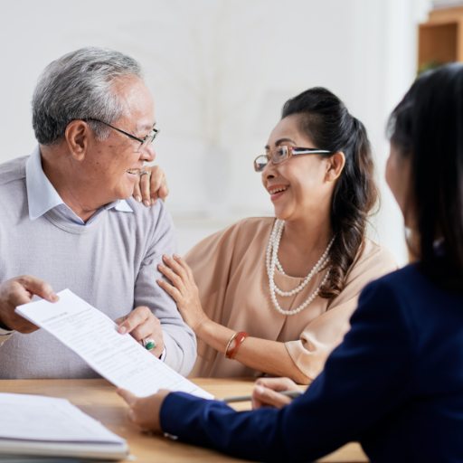 Dental patients discussing the cost of dental implants