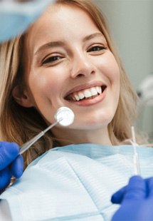 Closeup of woman smiling during dental checkup