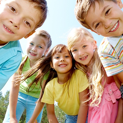 Group of kids smiling after children's dentistry visit