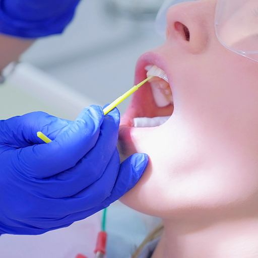 Patient receiving fluoride treatment