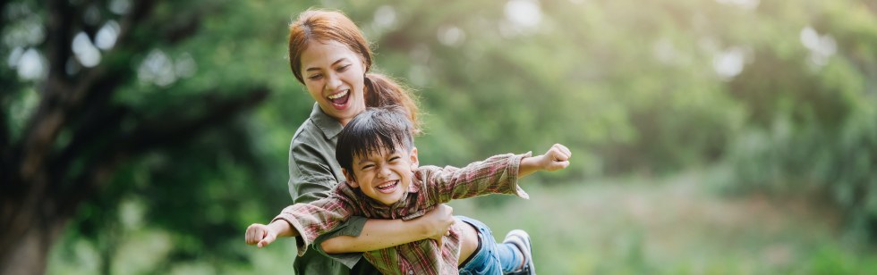 Mother and child with healthy smiles thanks to dental services