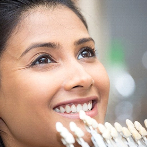 woman smiling while getting veneers in Fort Worth