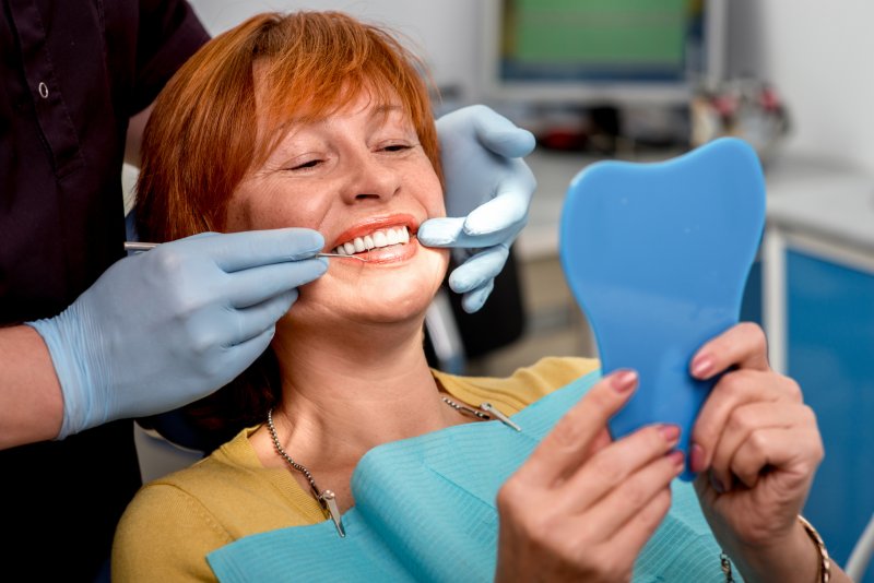 An older woman at the dentist to get her lower denture relined